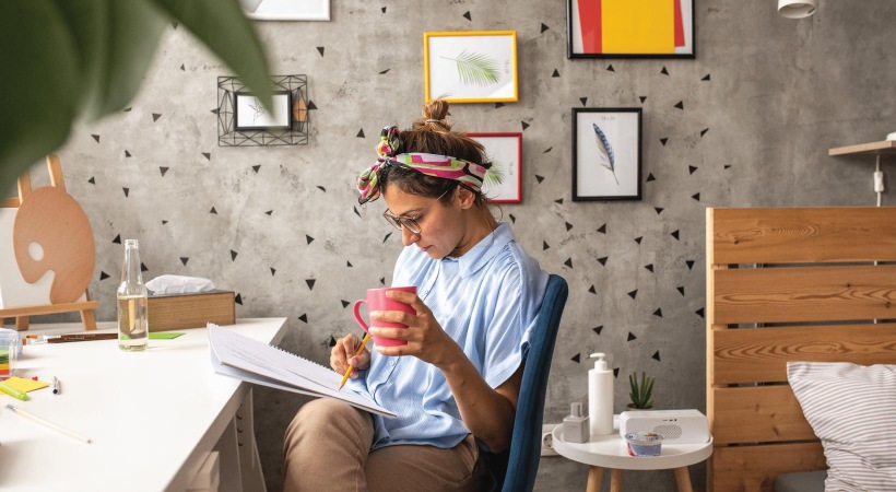 a woman sitting at a table